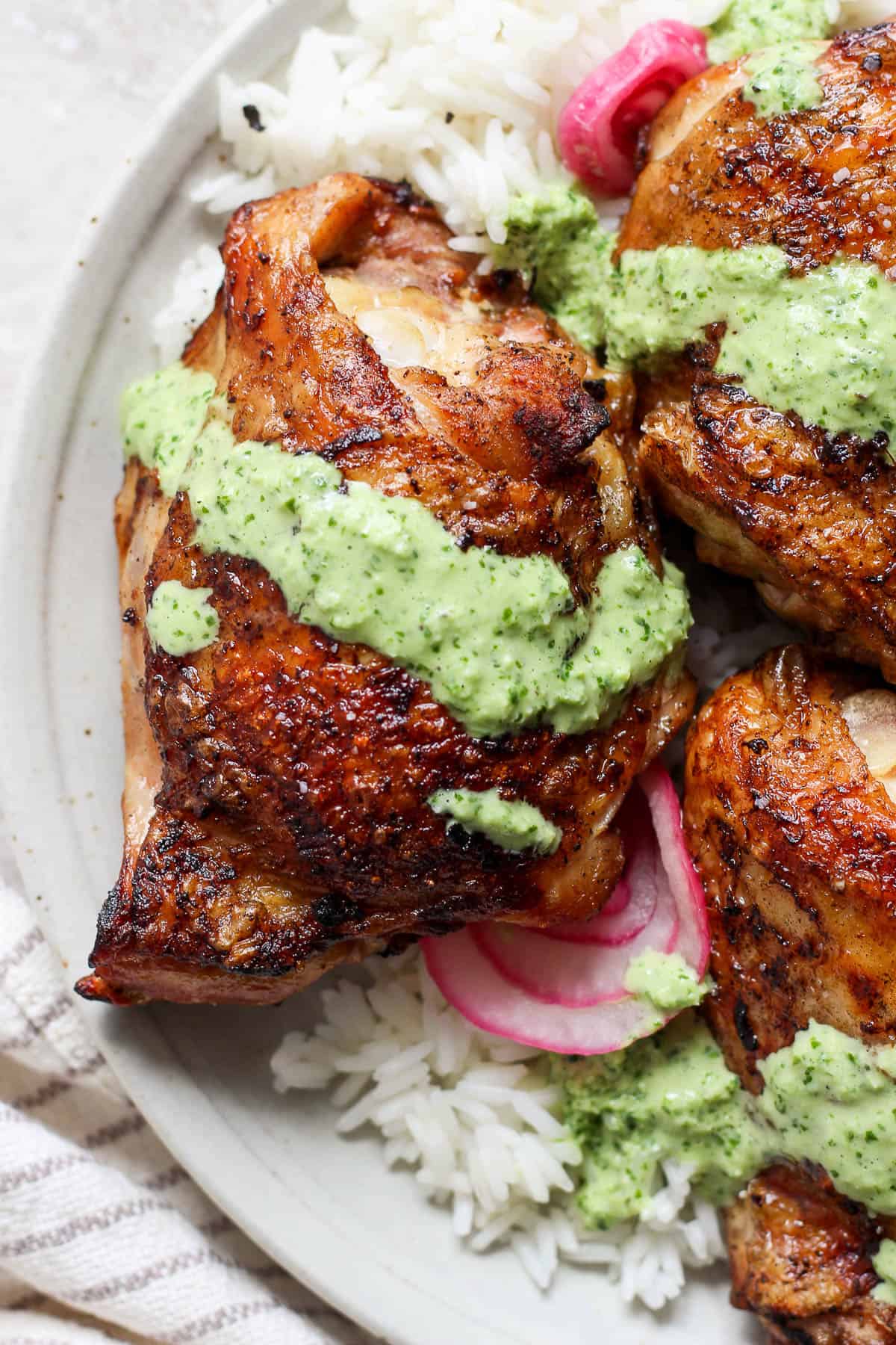 Peruvian green sauce drizzled over chicken.