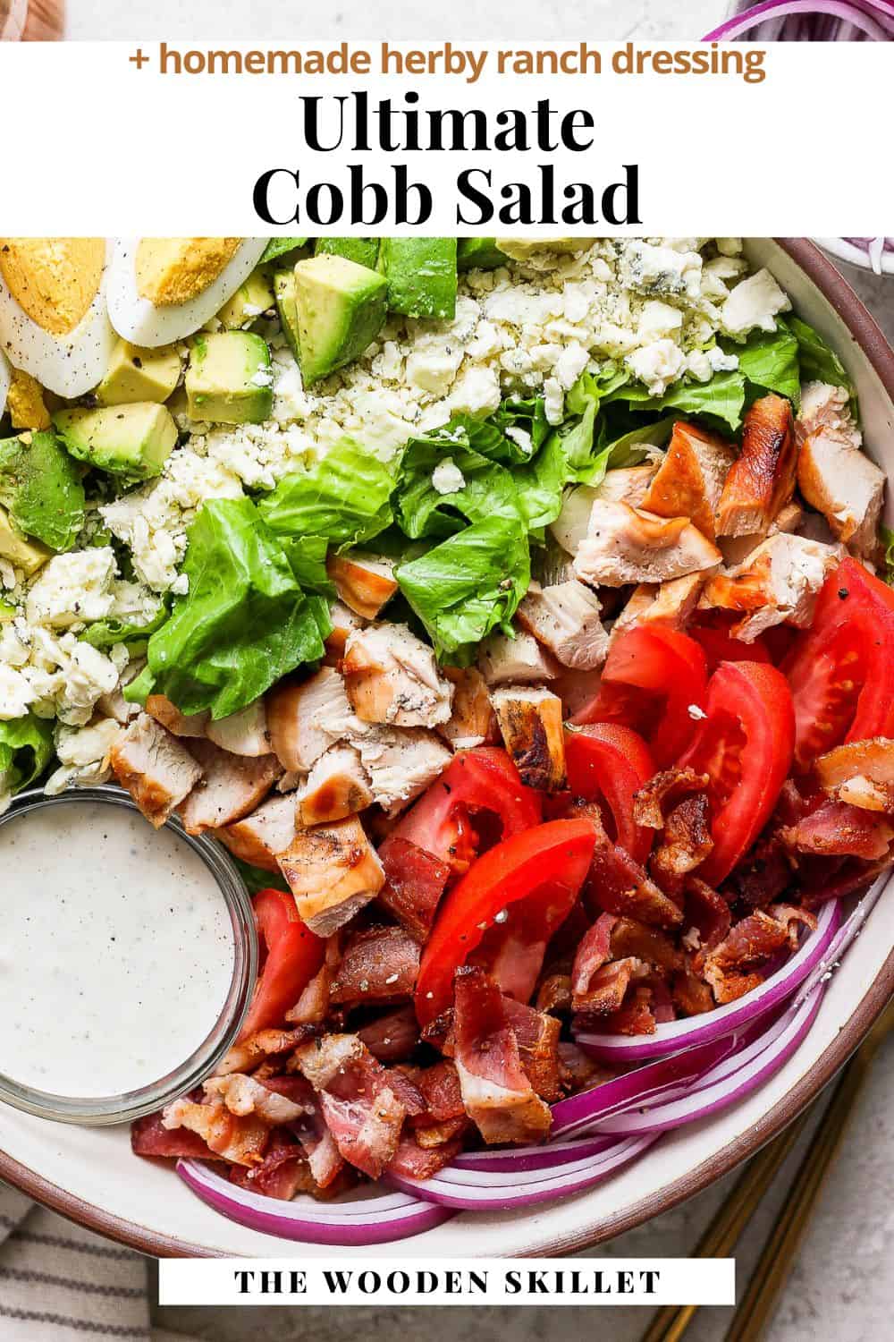 Pinterest image showing a bowl of cobb salad with the title Ultimate Cobb Salad + homemade herby ranch dressing.