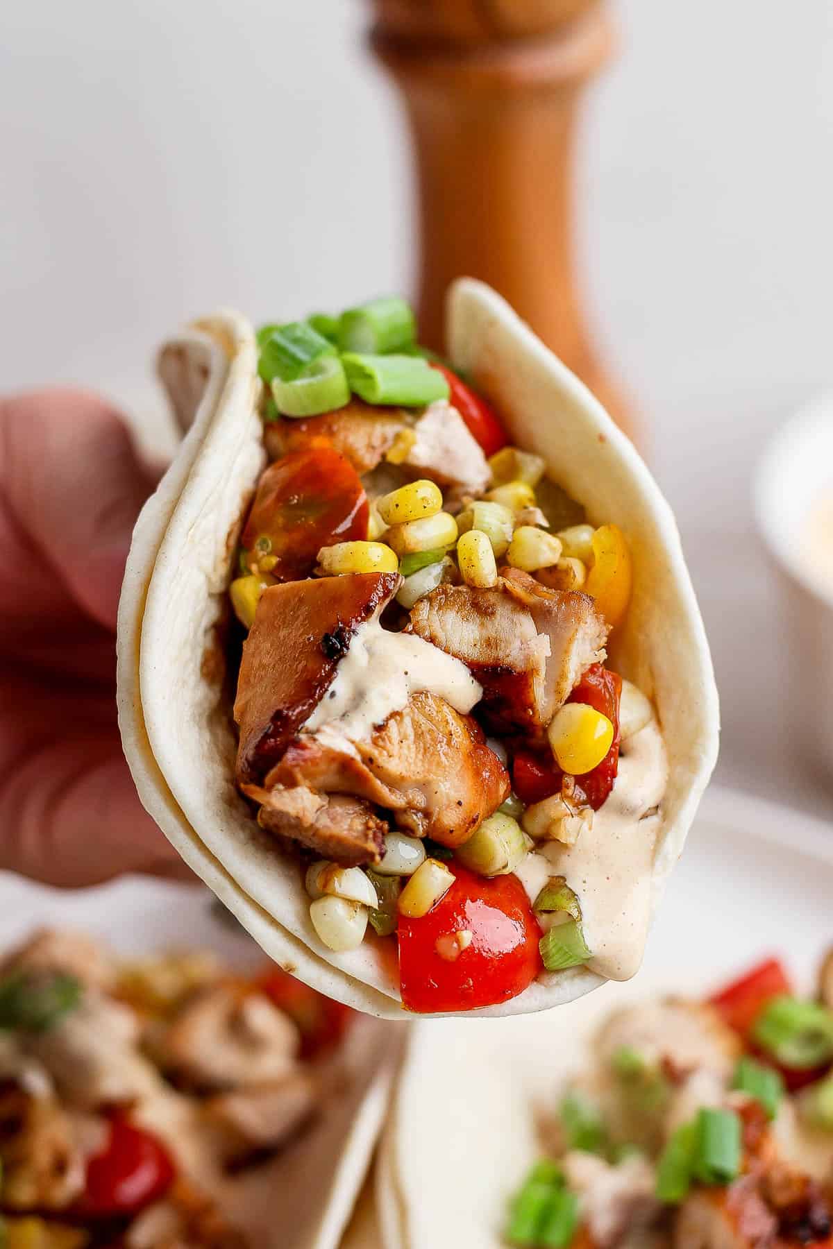 The best recipe for chicken tacos made on the Blackstone griddle.