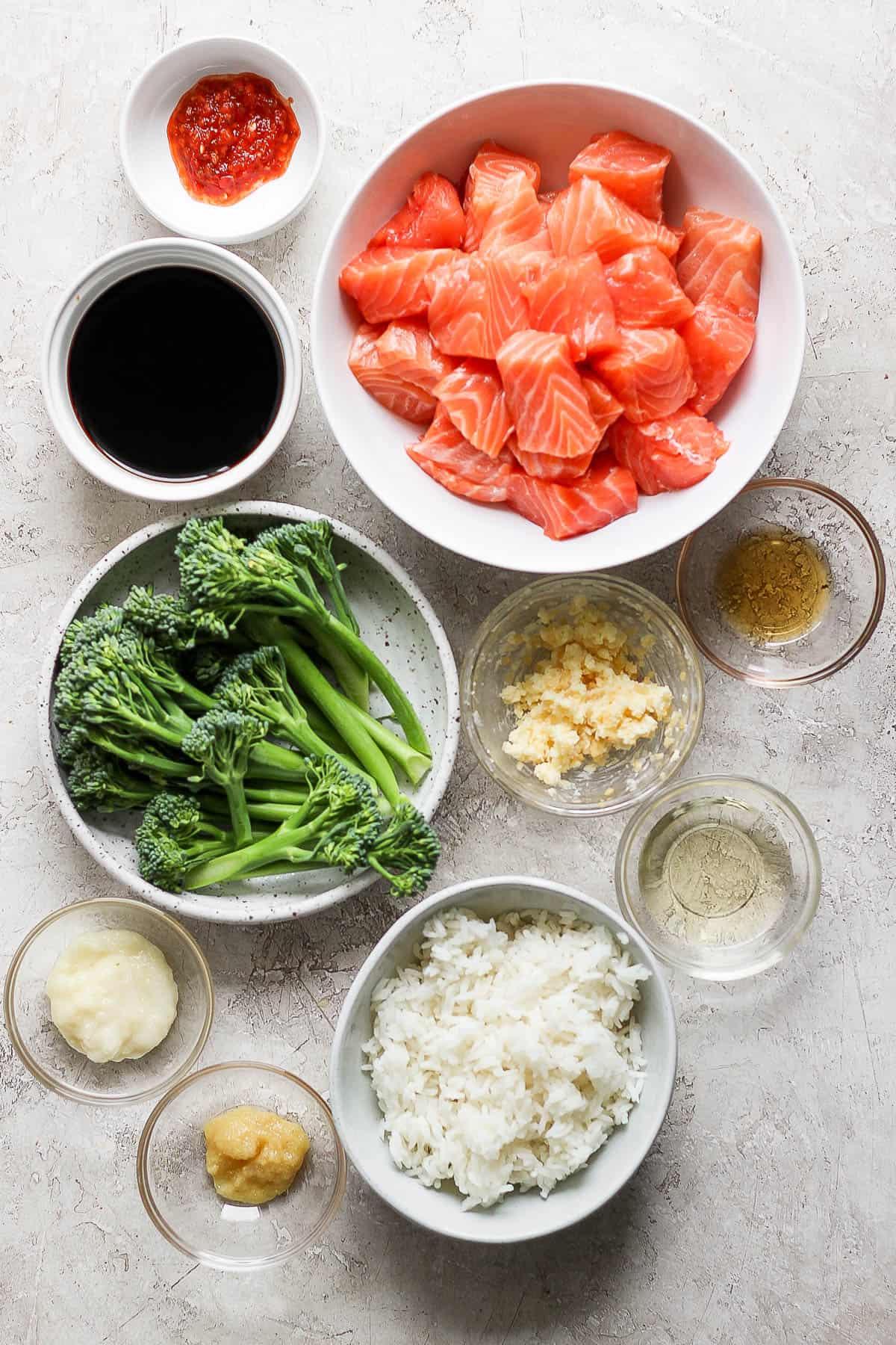 Ingredients for Blackstone salmon bites in separate bowls.