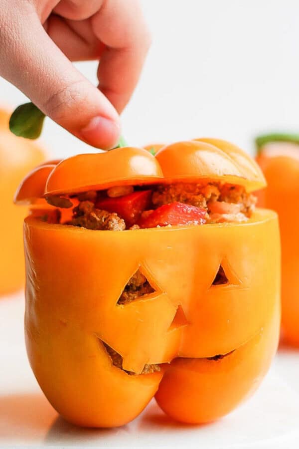 The best jack o lantern stuffed peppers recipe.