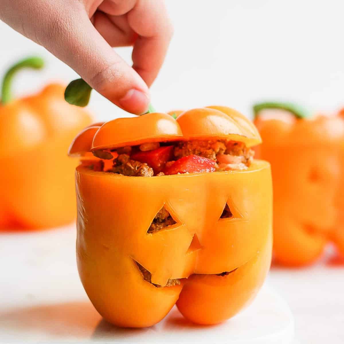 The best jack o lantern stuffed peppers recipe.
