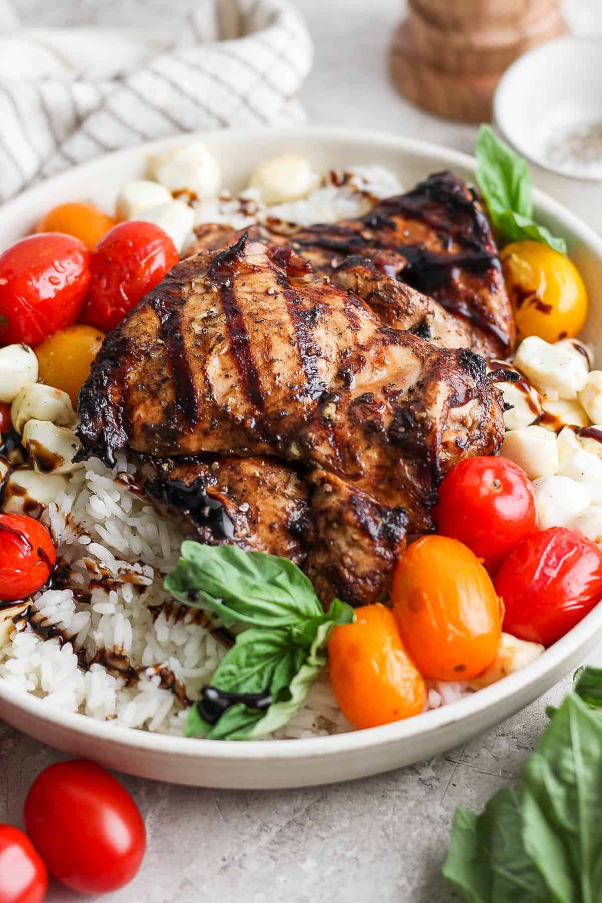 A close-up shot of a balsamic chicken rice bowl.