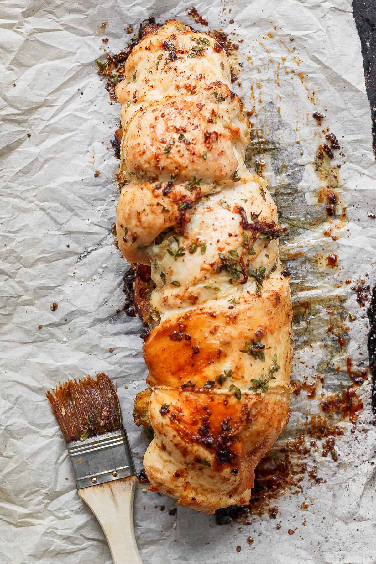 A baked stuffed turkey breast.