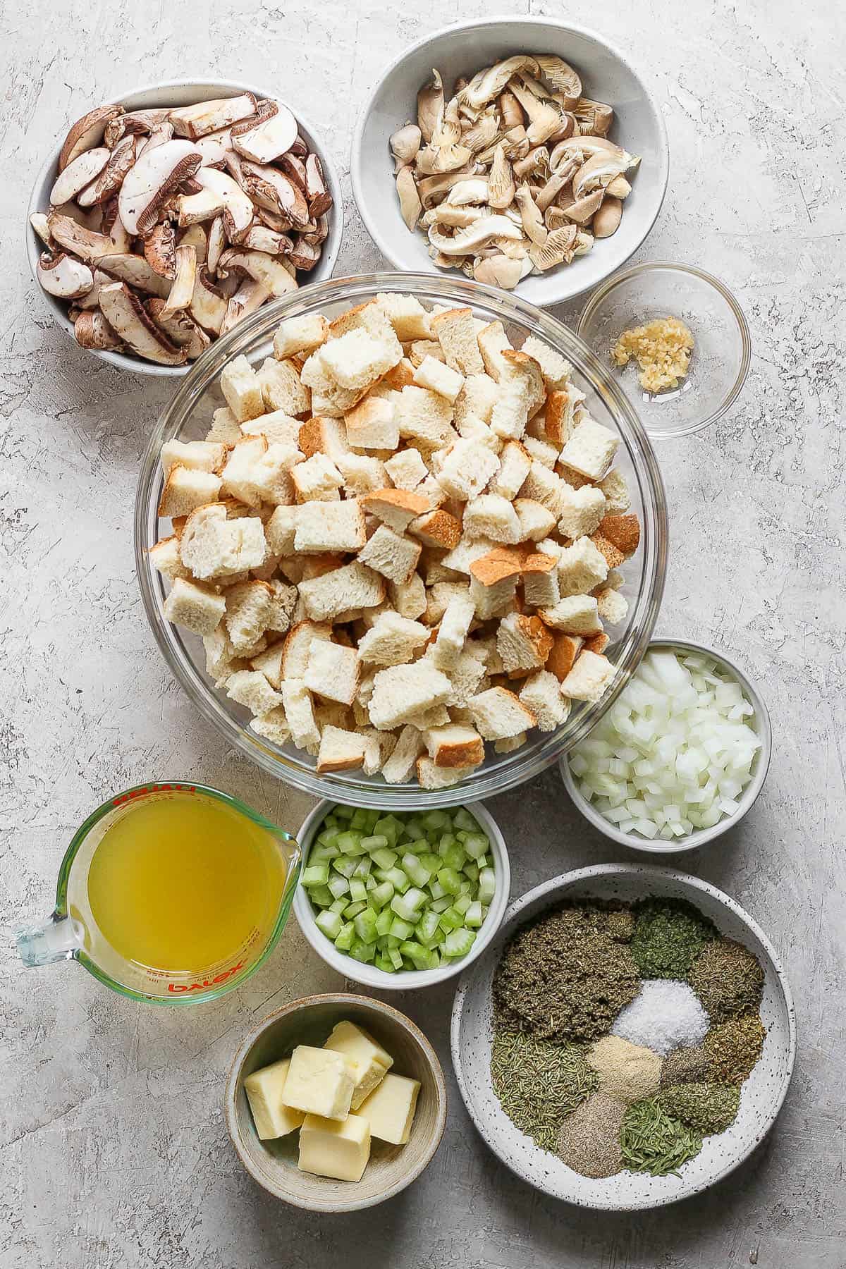 Ingredients for crock pot stuffing in separate bowls.