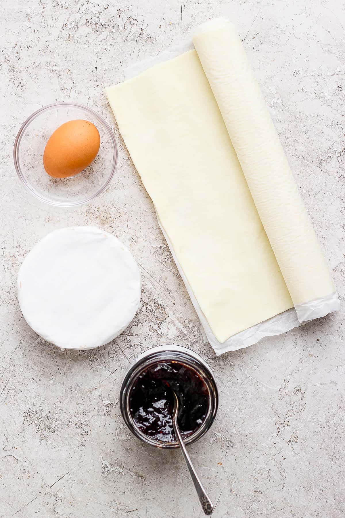 Baked brie ingredients on the counter top.