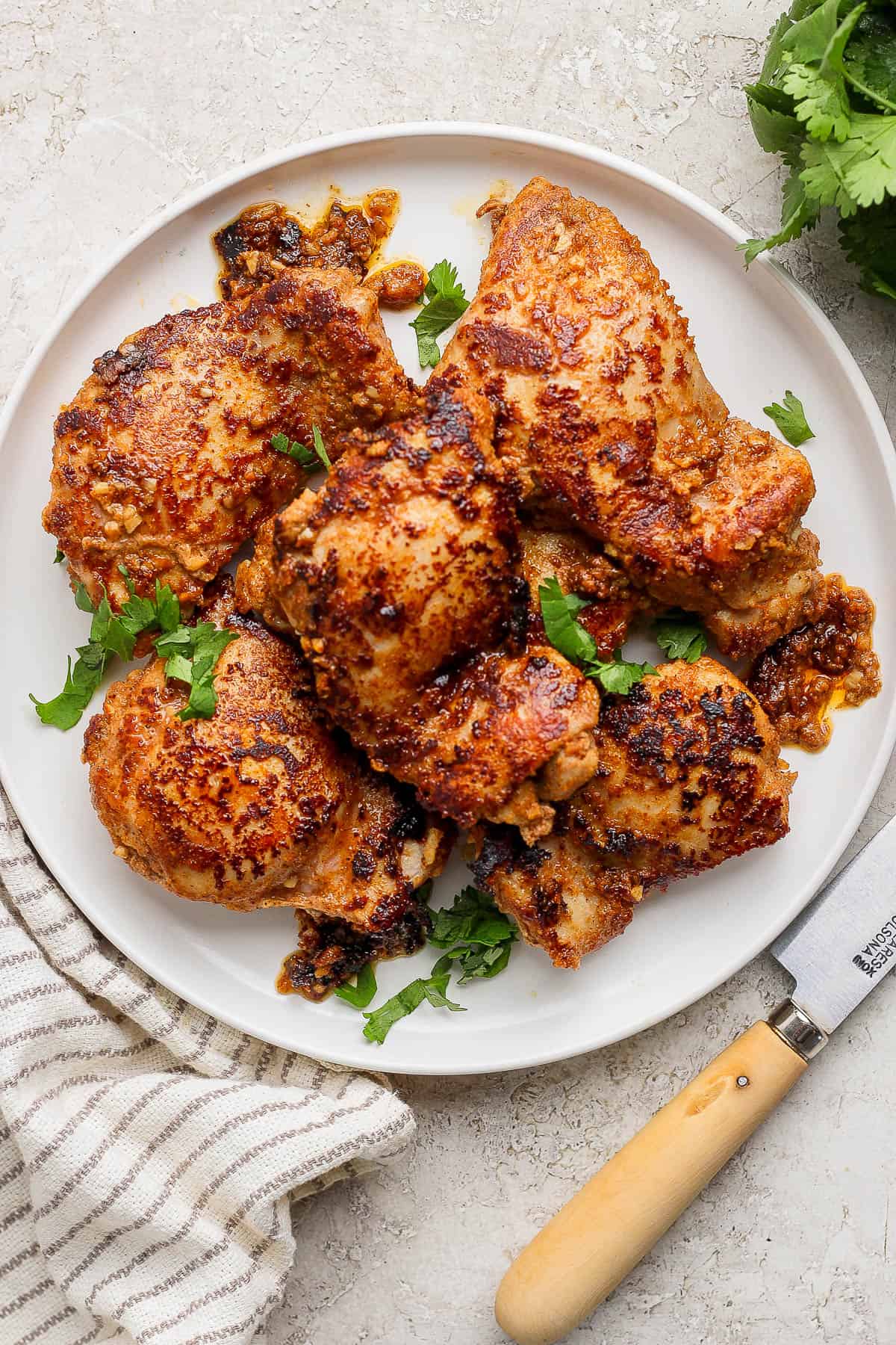 Chicken shawarma on a white plate.