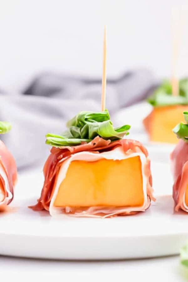 The best recipe for prosciutto-wrapped melon with basil.