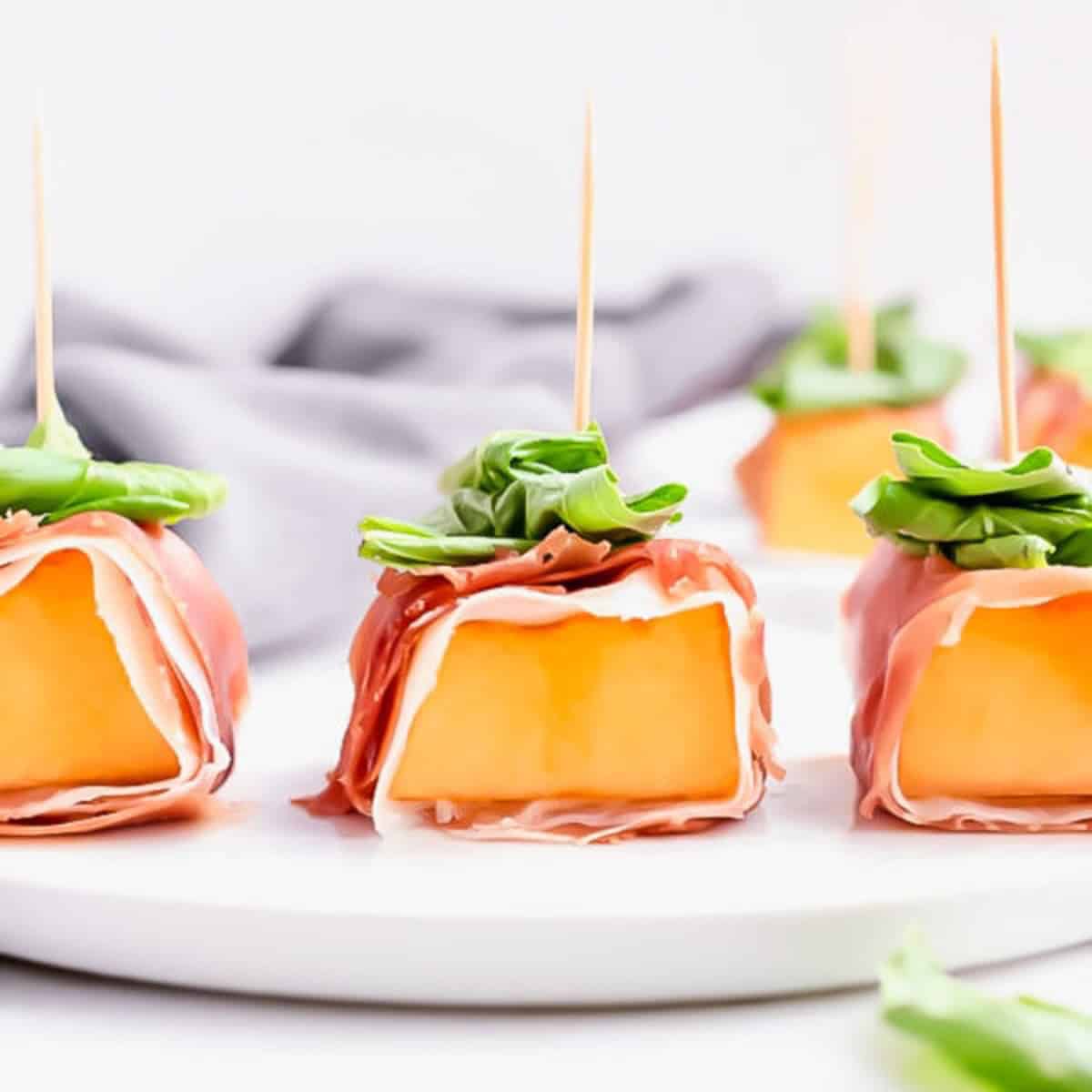 The best recipe for prosciutto-wrapped melon with basil.