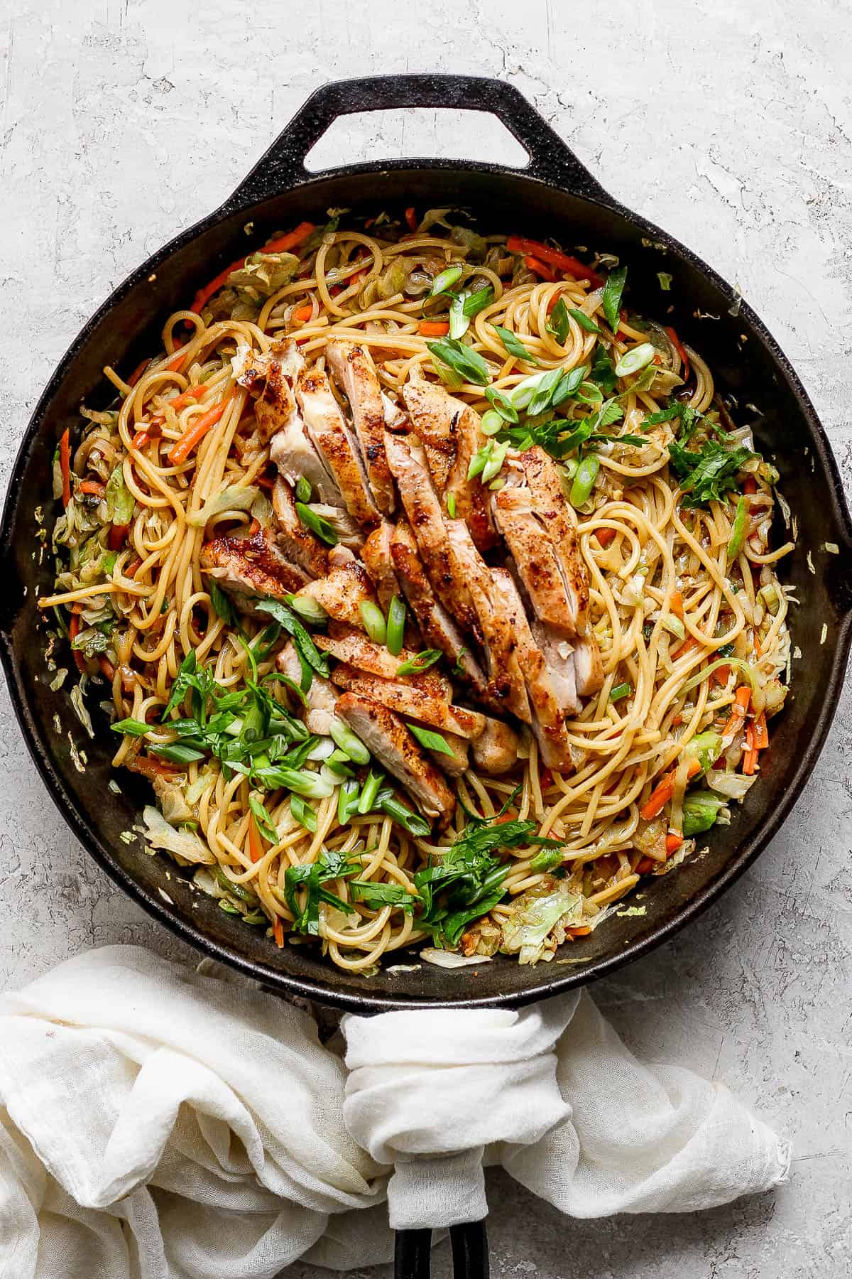 Fully cooked chicken chow mein in the skillet.