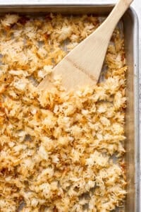 Crispy rice on a sheet pan for bang bang chicken salad.