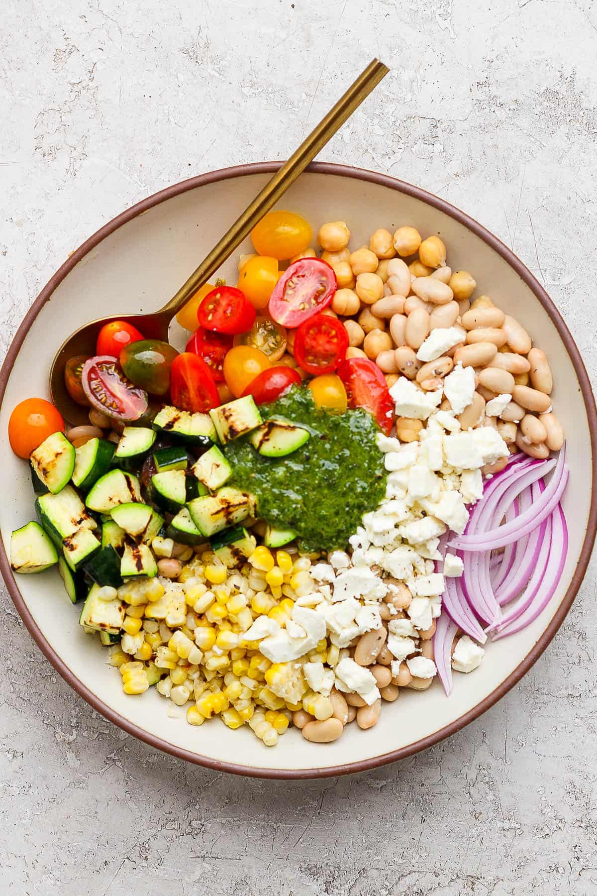 All salad ingredients in a shallow serving bowl.