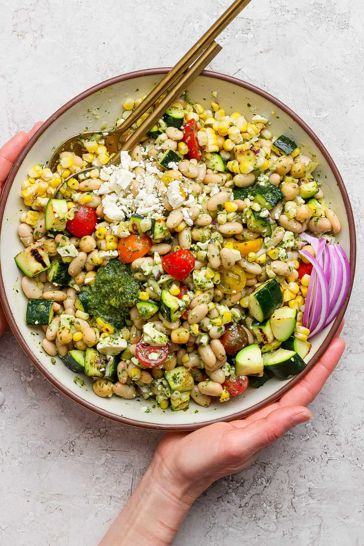 Dense bean salad in a shallow serving bowl.