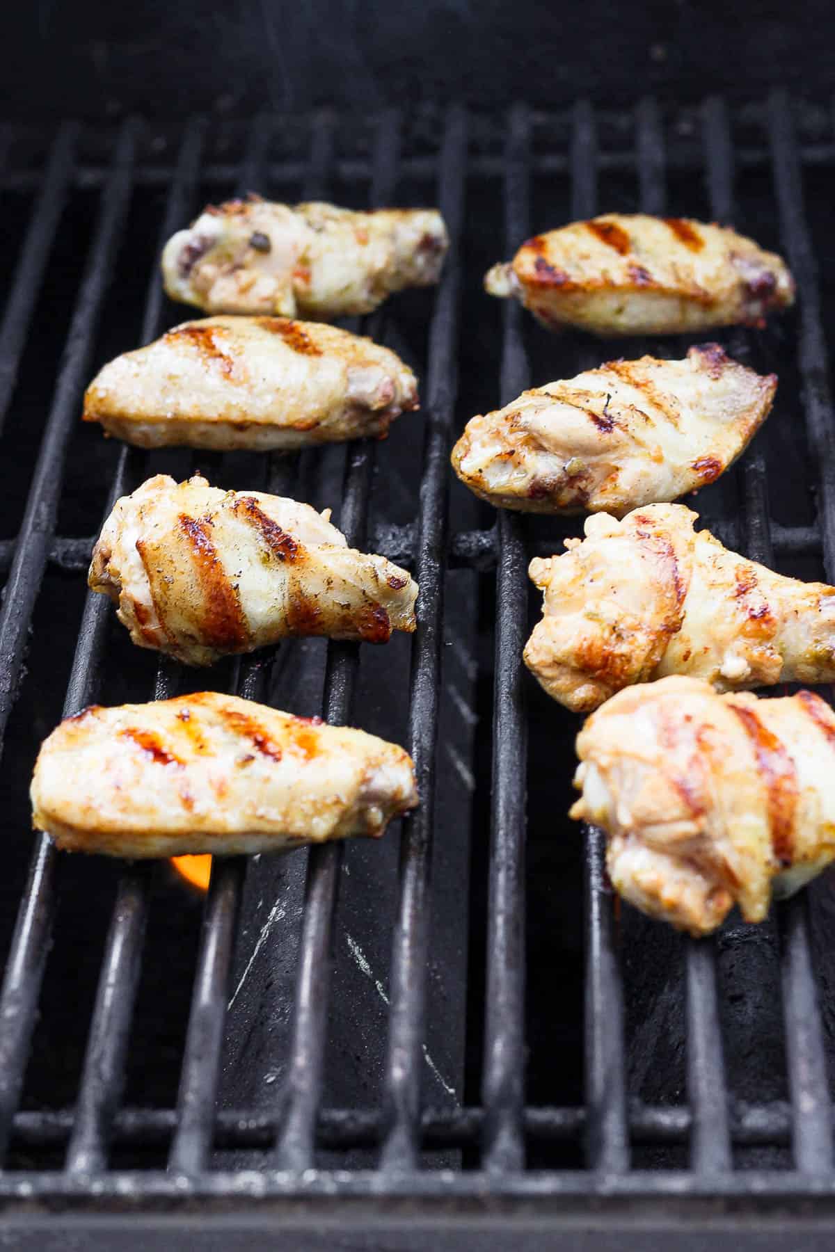 Chicken wings on the grill.