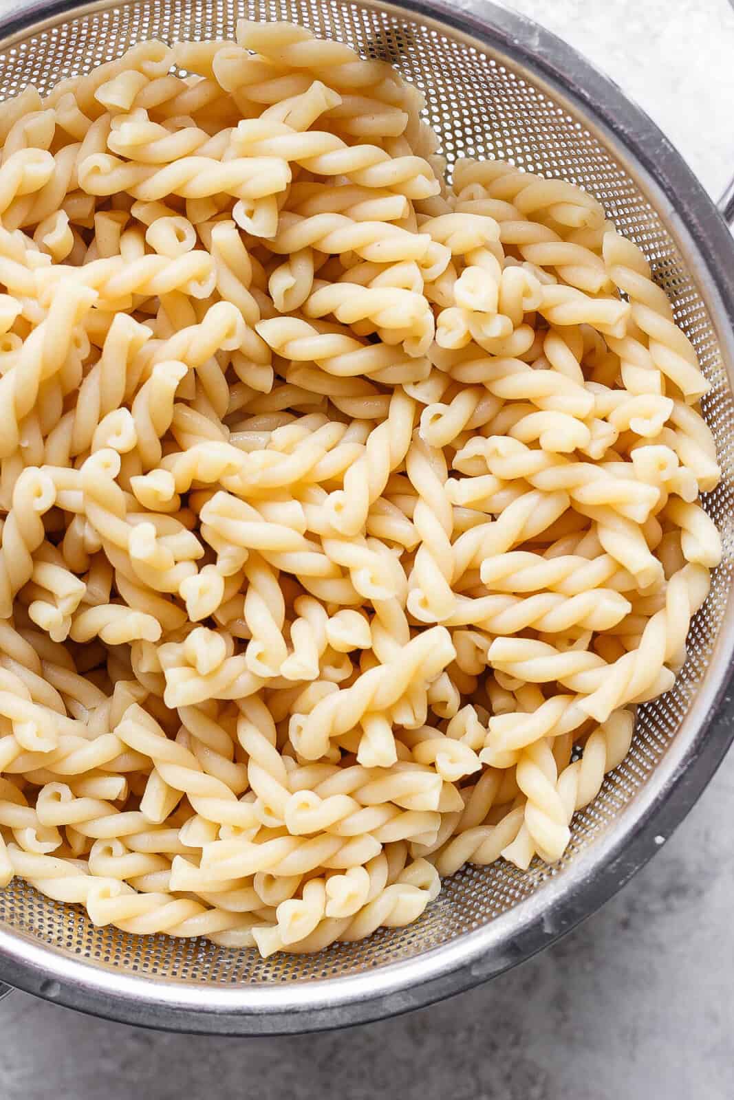 Cooked gemeli noodles for bacon ranch pasta salad. 