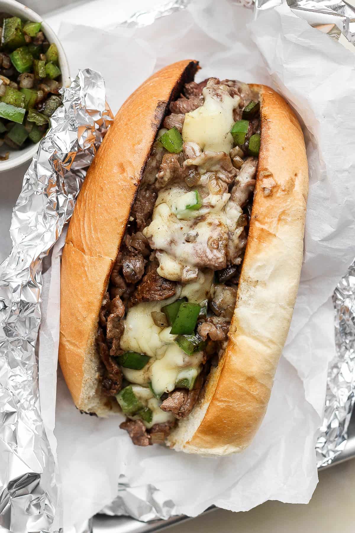 A philly cheesesteak wrapped in foil.
