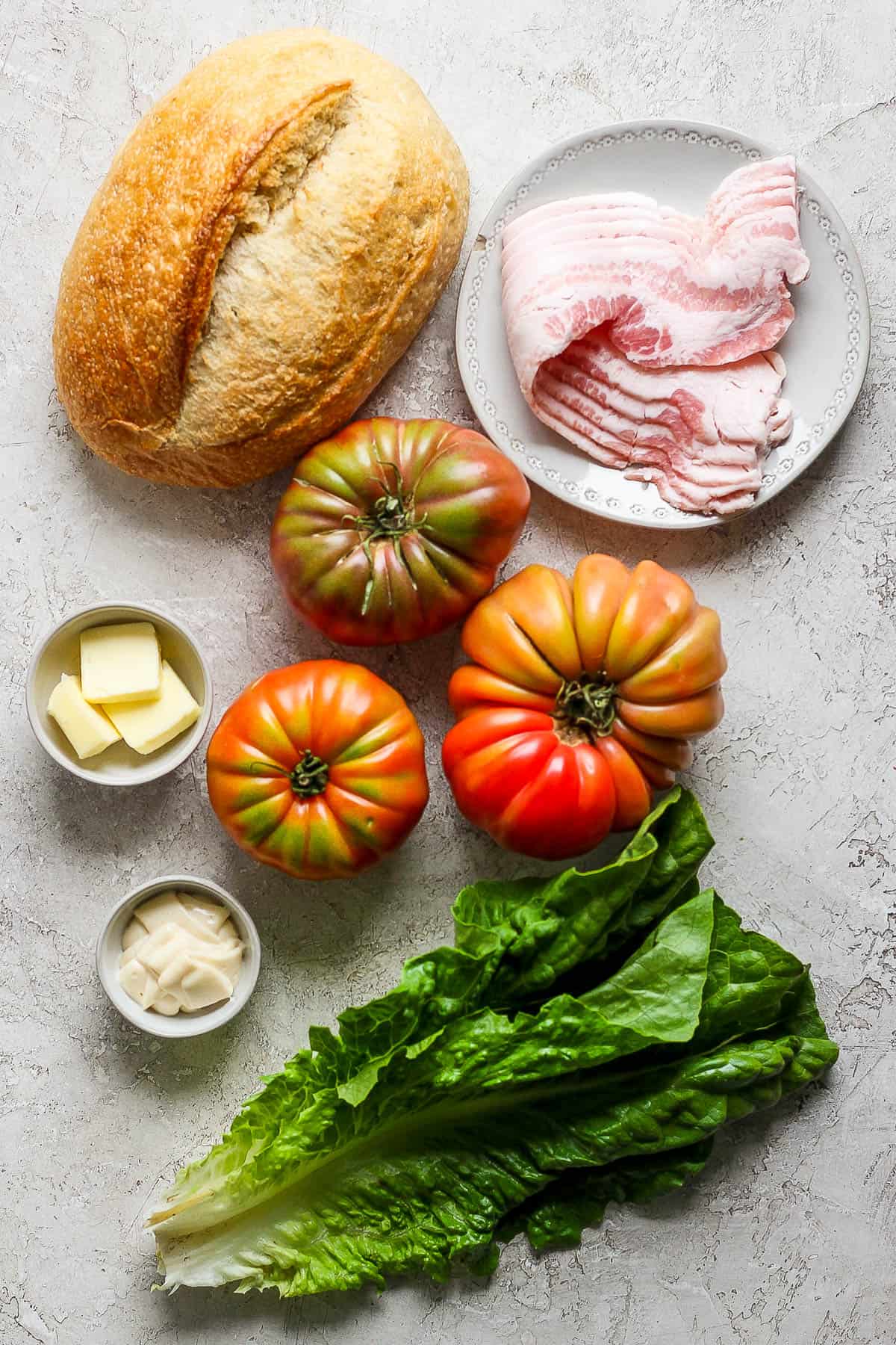 Ingredients for grilled blts on the counter.