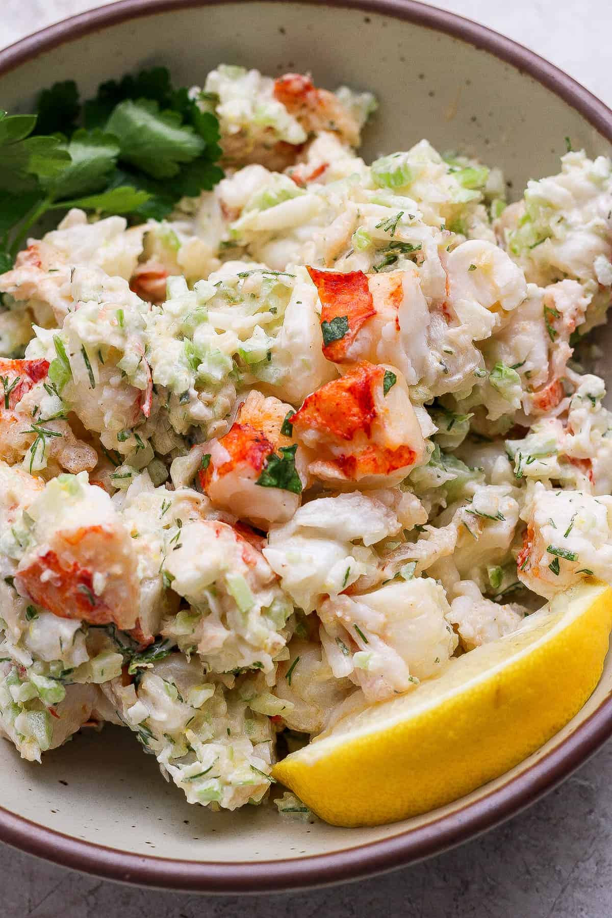 Lobster salad in a serving bowl.