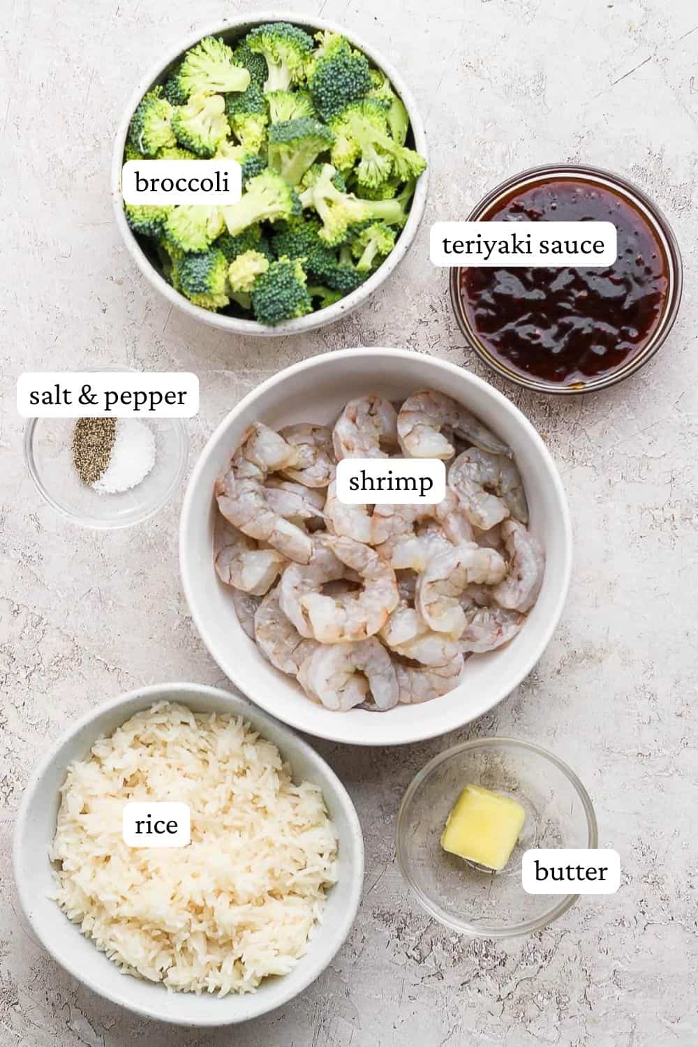 Teriyaki shrimp ingredients of broccoli, teriyaki sauce, salt and pepper, shrimp, butter, and rice.