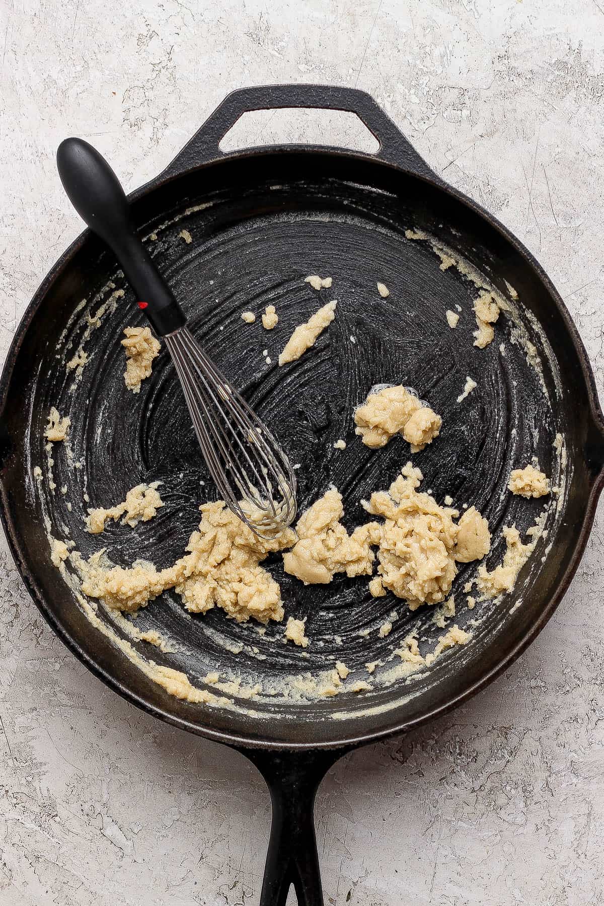 Flour and butter whisked together in a skillet.