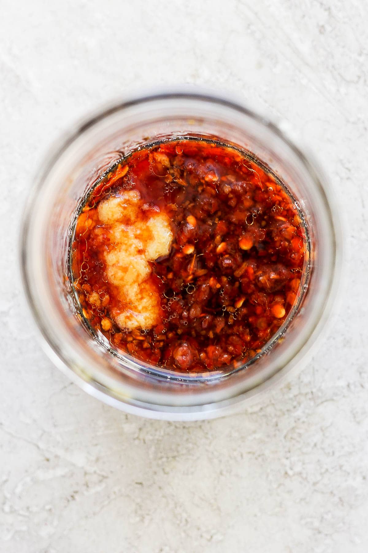 Ingredients for fried rice sauce in a mason jar before mixing.