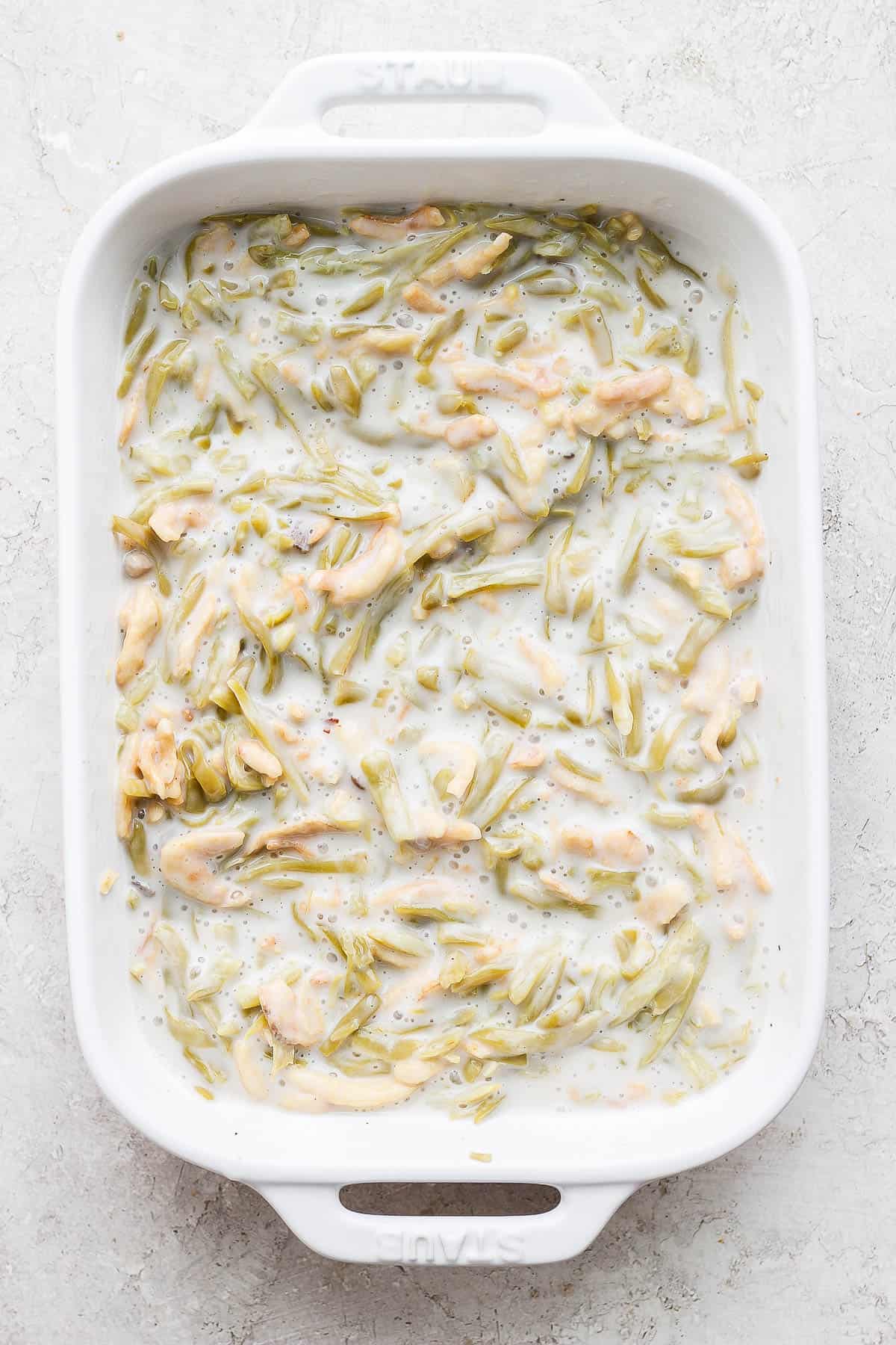An easy green bean casserole dish before going into the oven to bake.