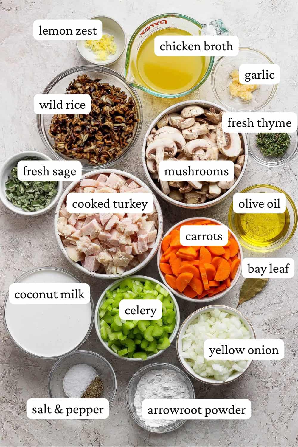 Turkey wild rice soup ingredients in separate bowls with labels.
