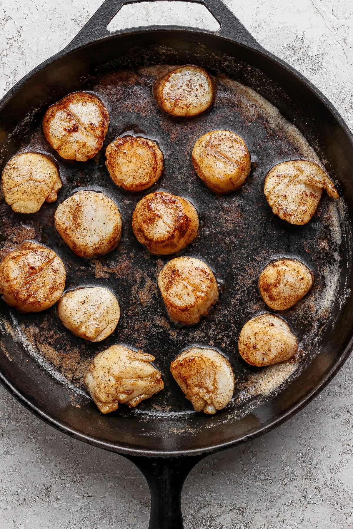 Brown butter scallops in a cast iron skillet.