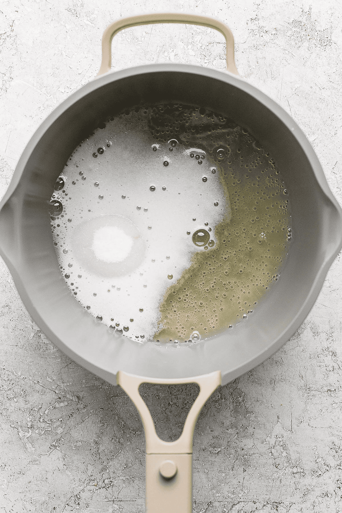 Champagne, lemon juice, and sugar in a sauce pan.