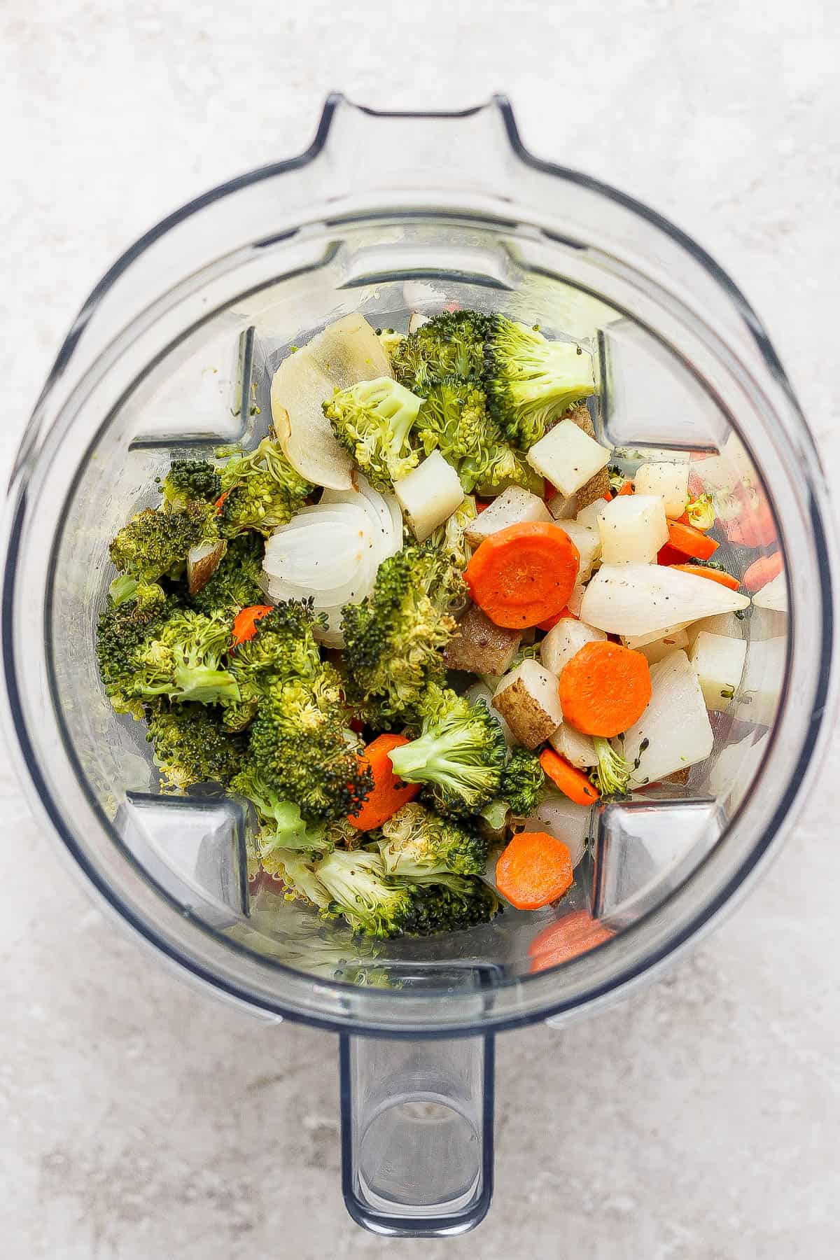 Roasted broccoli, onion, carrots, and celery in a blender