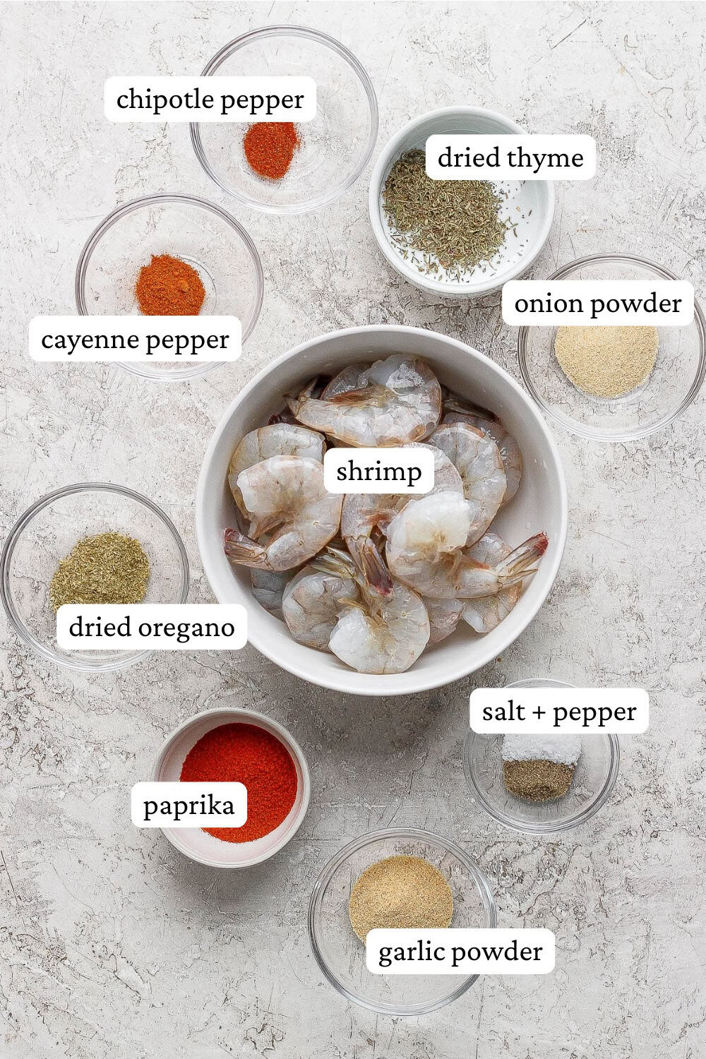 Grilled blackened shrimp ingredients in separate bowls with labels.