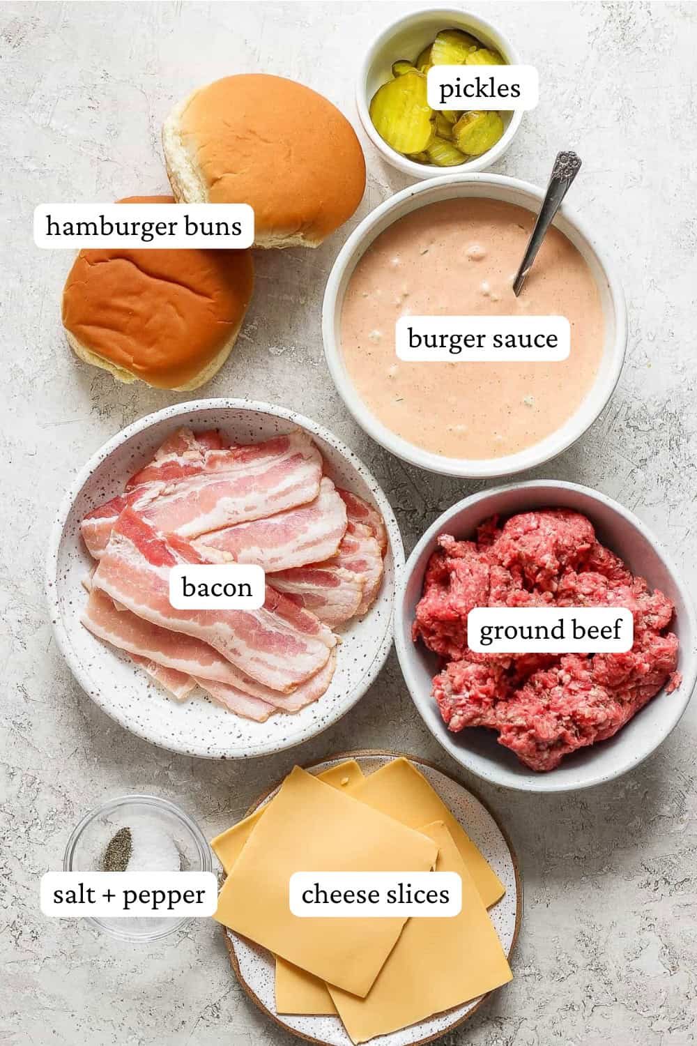 Ingredients for blackstone smash burgers in separate bowls with labels.