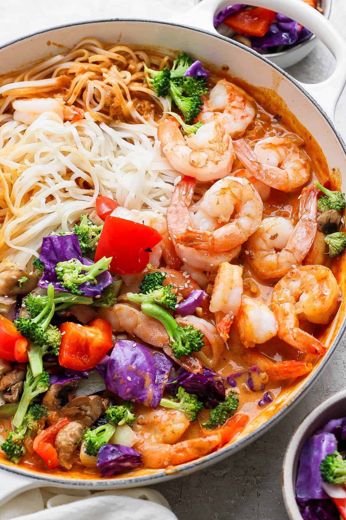 Shrimp and rice noodles tossed in a sweet curry sauce with roasted veggies added to the braising pan.