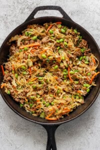 Blackstone egg roll in a bowl made in a cast iron skillet.