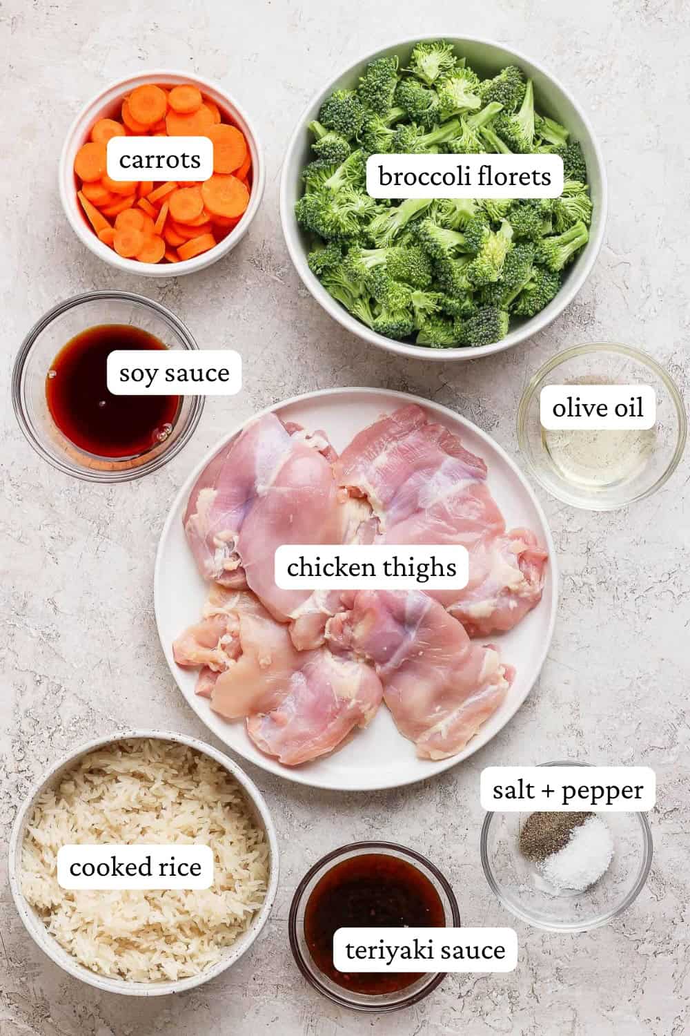 Ingredients for Blackstone teriyaki chicken in separate bowls with labels.