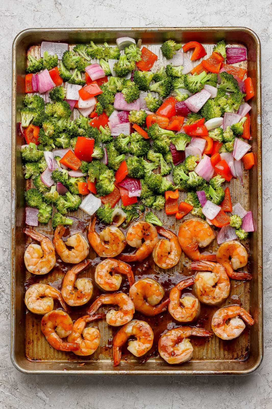 Teriyaki shrimp sheet pan dinner on a sheet pan after baking in the oven.