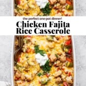 Chicken fajita casserole with rice topped with cheese, cilantro, and sour cream.