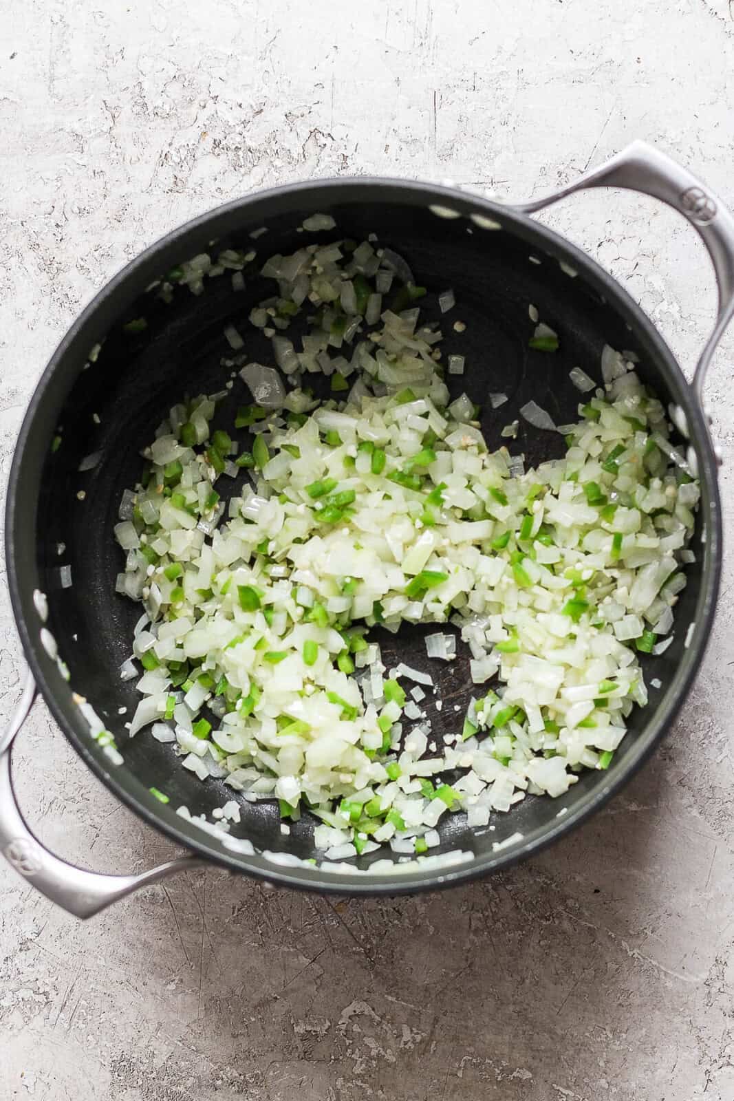 Sautéed onion, garlic, and jalapeño in a dutch oven to make bison chili.