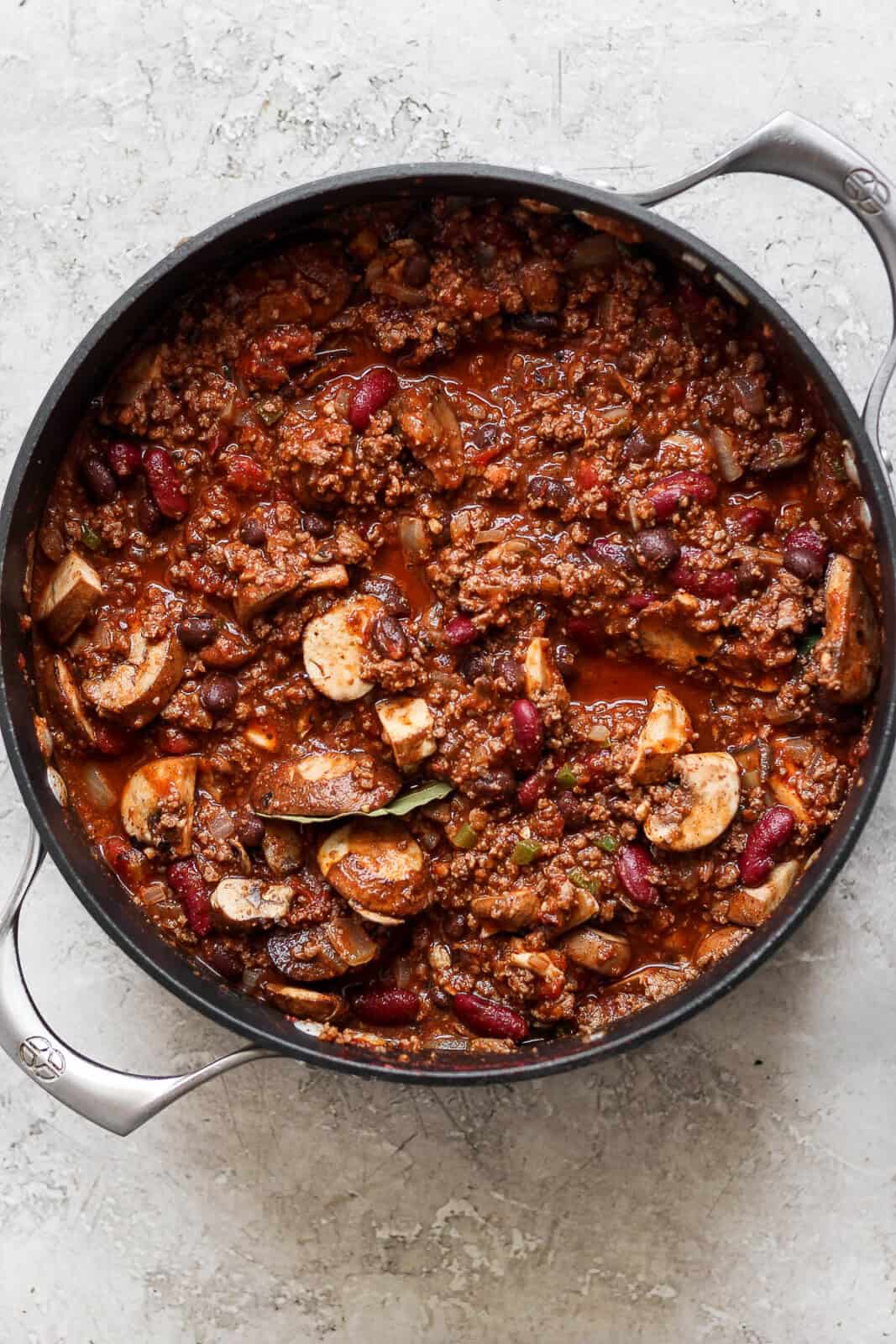Fully cooked bison chili in a large dutch oven.