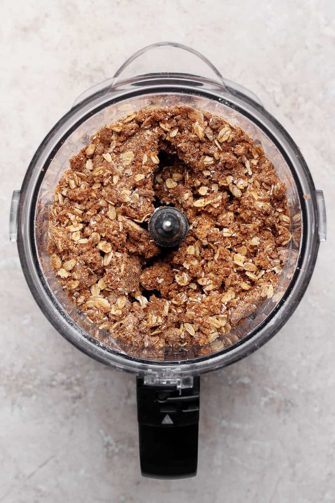 Healthy apple crisp topping mixed together in a food processor.