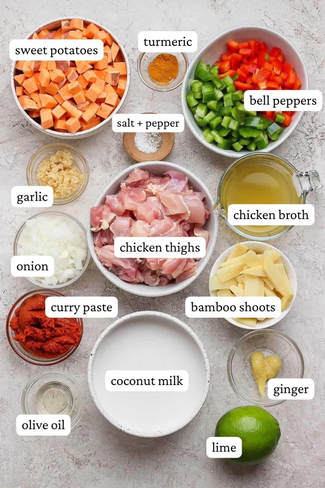 Sweet potato chicken curry ingredients in separate bowls with labels.